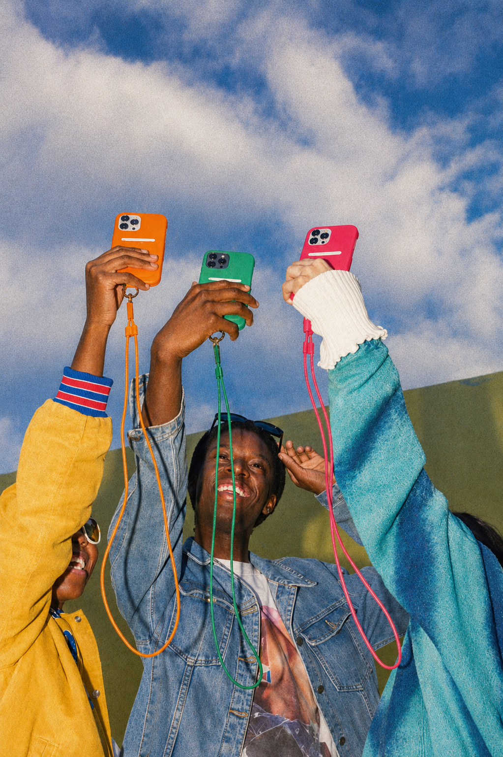 Creators holding up phones together